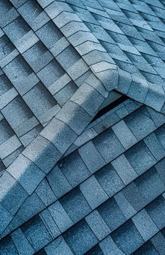 Storm Damage Roof Repair X